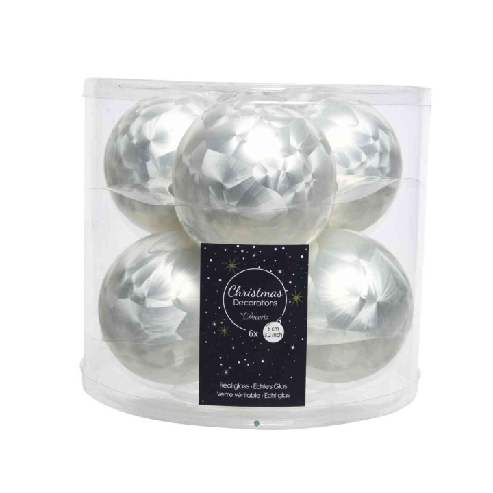 A clear container holds six shiny silver Christmas ornaments with a faceted design.