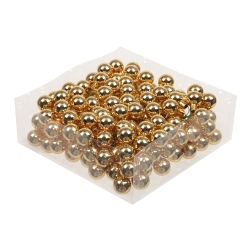 A clear box filled with shiny gold balls, reflecting light with a glittery finish.