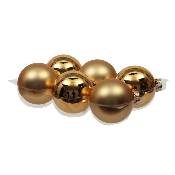 Zes glanzende, gouden ballen in een elegante, ronde vorm op een lichte achtergrond.