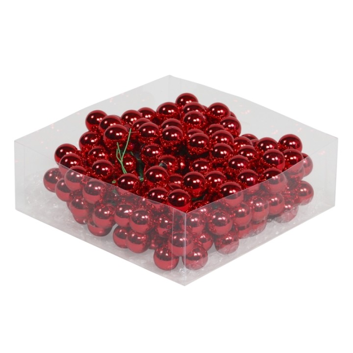 Shiny red decorative balls packed in a clear plastic box.