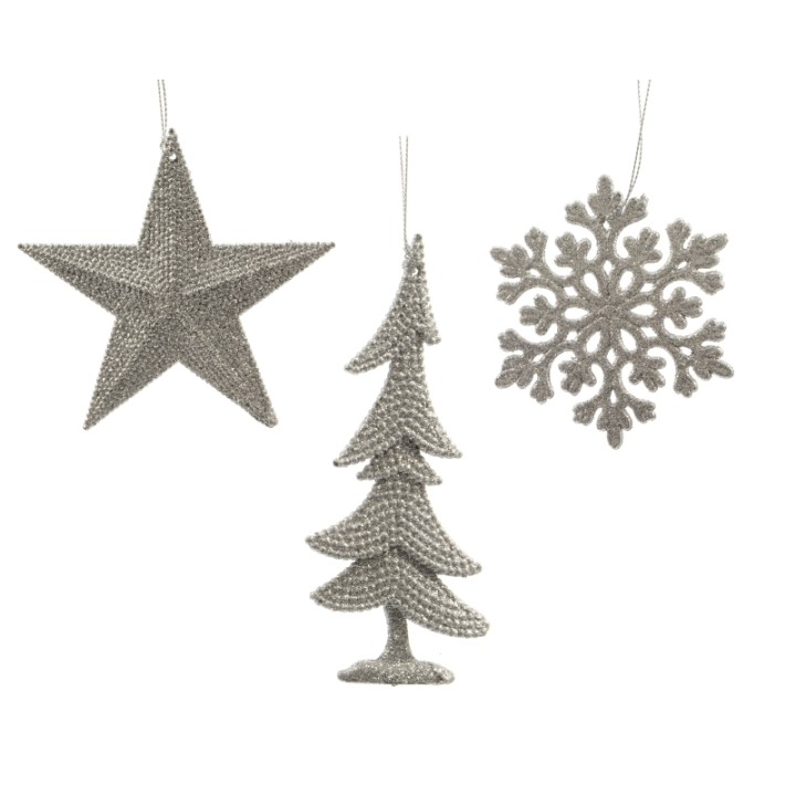 Décorations de Noël scintillantes en argent : étoile, sapin et flocon de neige.