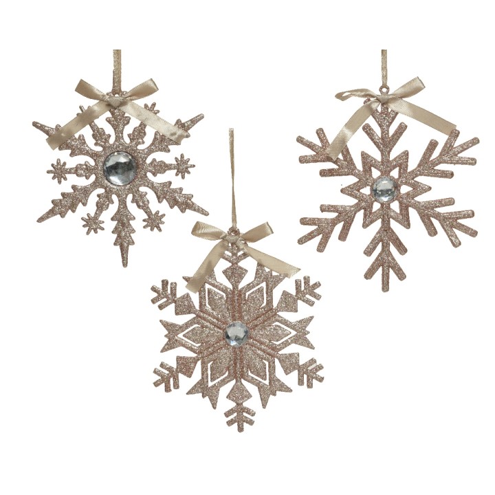 Flocons de neige scintillants en doré avec des détails brillants et des rubans délicats.