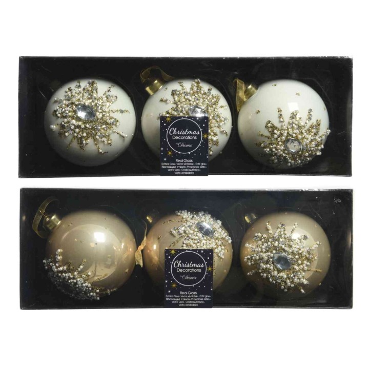 Elegant Christmas ornaments in white and gold, featuring intricate snowflake designs and gems.