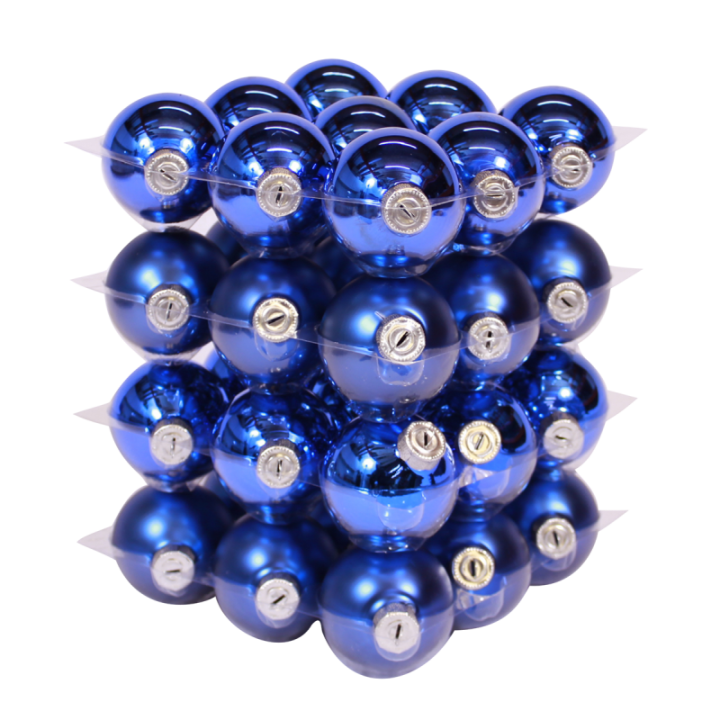 A stacked arrangement of glossy blue spheres with silver accents, reflecting light.