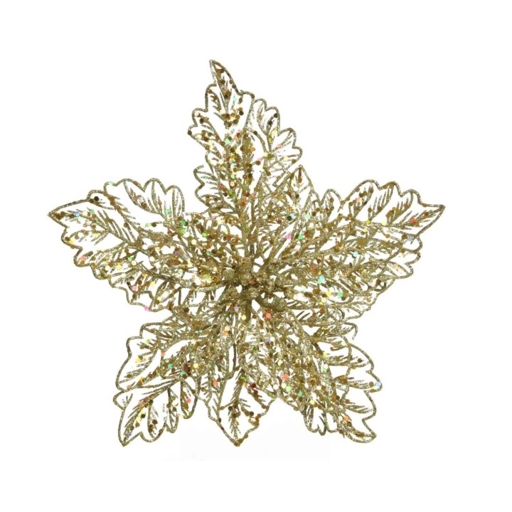 A glittering gold star-shaped ornament with intricate leaf patterns.