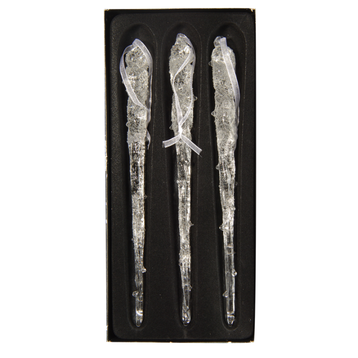 Three delicate, clear glass icicles with textured surfaces, elegantly displayed on a black backgr...