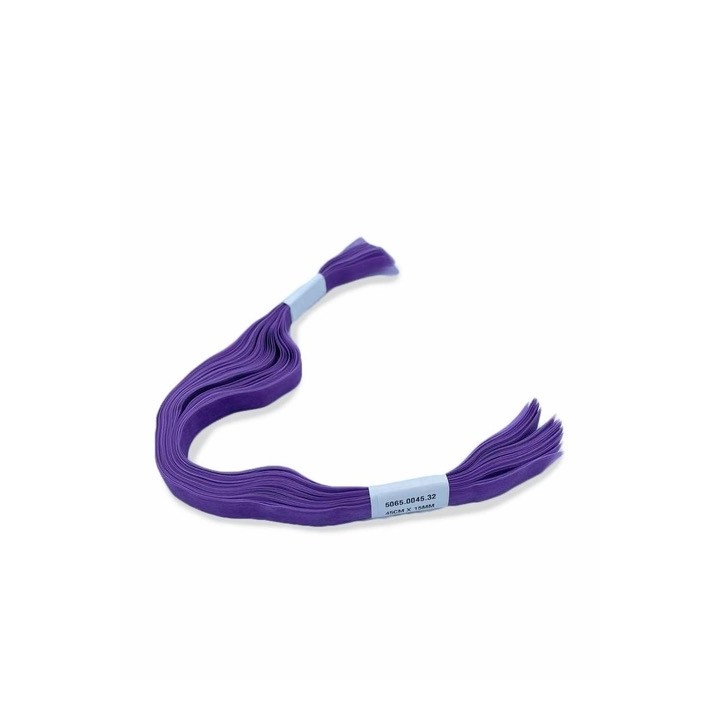 A vibrant purple strand of embroidery floss with a light blue label.