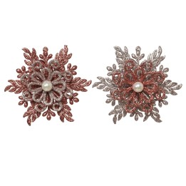 Two ornate brooches, one in shimmering red and the other in silver, each adorned with a central p...
