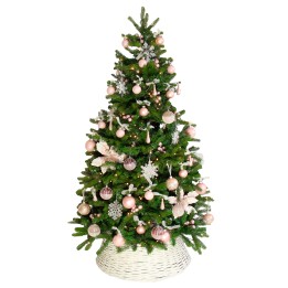 A lush green Christmas tree adorned with pink ornaments and white snowflakes.