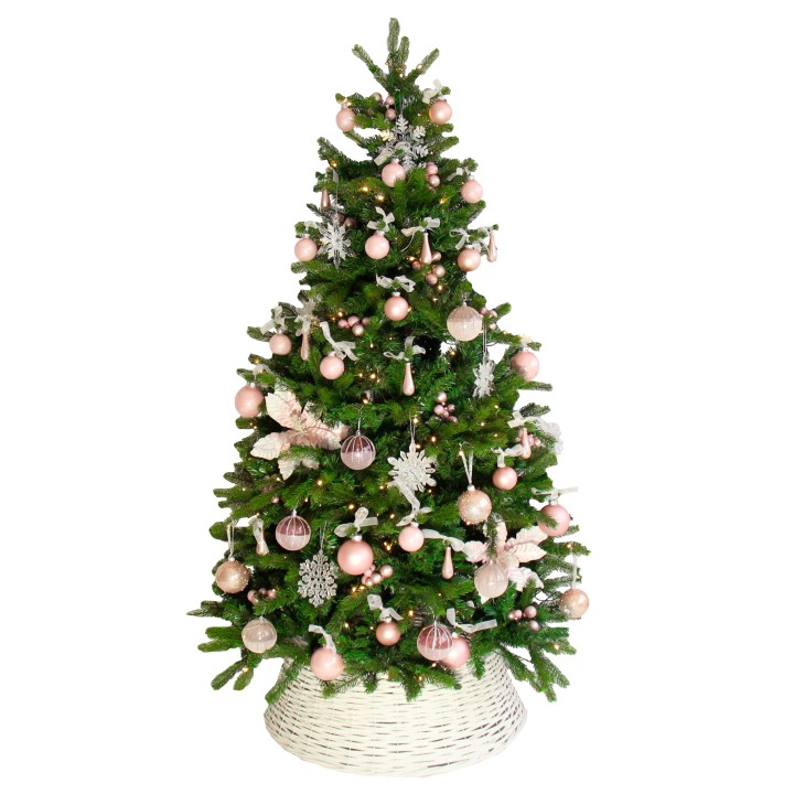 A lush green Christmas tree adorned with pink ornaments and white snowflakes.