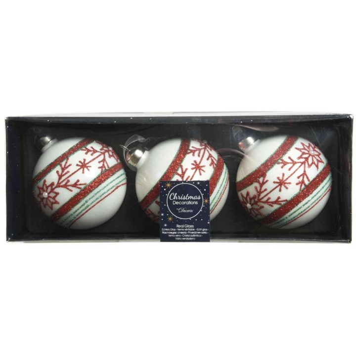 Drie witte kerstballen met rode en groene versieringen in een chique doos.