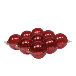 A cluster of shiny red spheres arranged on a sleek silver tray.