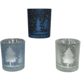 Frosted glass candle holders with snowy trees, in shades of blue and white.