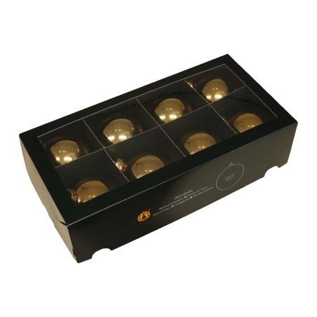 A sleek black box containing nine shiny golden spheres arranged in a grid. A sleek black box containing nine shiny golden spheres arranged in a grid.