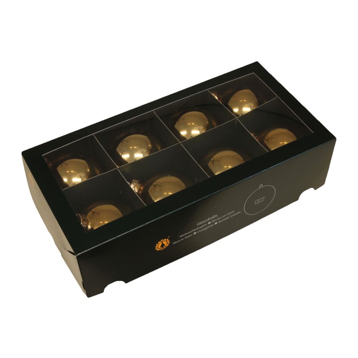 Boîte noire élégante contenant neuf boules dorées brillantes.
