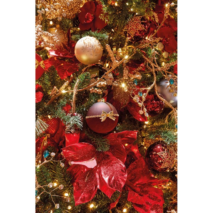 A festive arrangement of red and gold ornaments nestled among lush green pine branches.