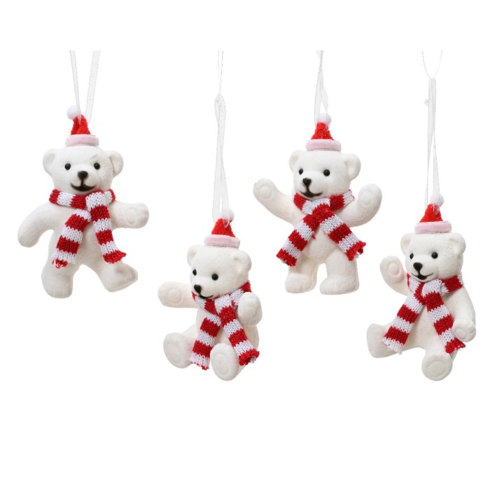 Vrolijke witte kerstberen met rode hoed en sjaal, hangend aan een draad.