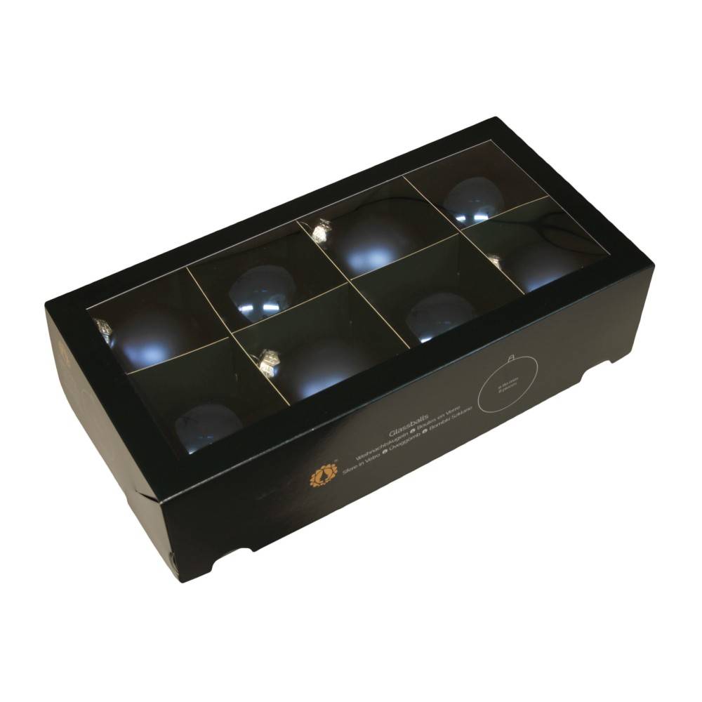 Coffret noir élégant contenant neuf sphères brillantes, éclairées et soigneusement disposées.