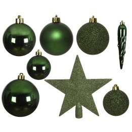 A collection of green ornaments including shiny balls, a star, and a twisted icicle.