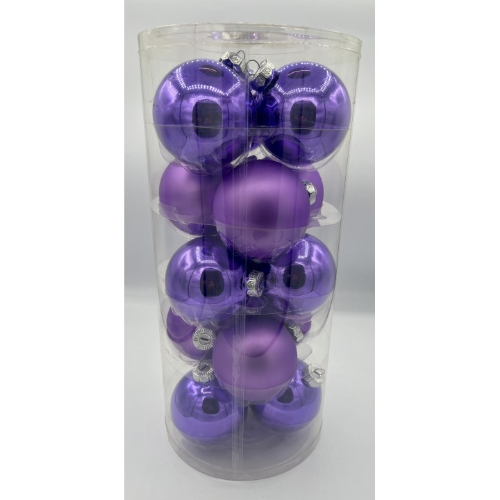 Glanzende paarse kerstballen in een doorzichtige cilinder, variërend in tinten en maten.
