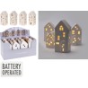 A set of ceramic houses in soft colors, illuminated from within, creating a cozy glow.