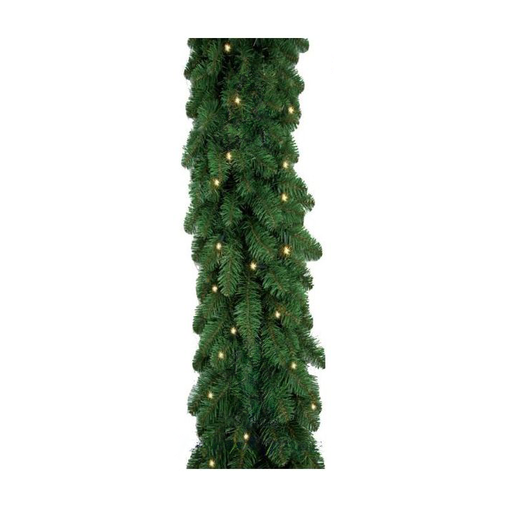 A lush green garland adorned with small warm white lights.