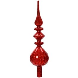 Ornement en verre rouge, forme élancée avec des courbes et un sommet pointu.