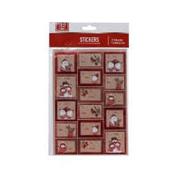 Two sheets of decorative stickers featuring snowmen and holiday motifs on a textured background.