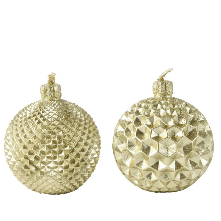 Two decorative gold ornaments with textured geometric patterns.