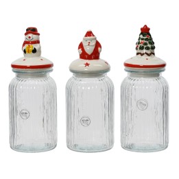 Three glass jars with festive lids: a snowman, Santa, and a Christmas tree.