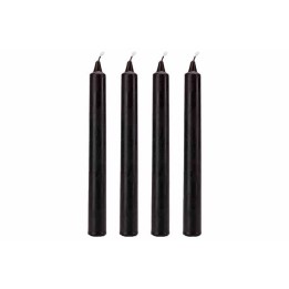 Four slender, black taper candles with pointed tips, arranged upright in a row.