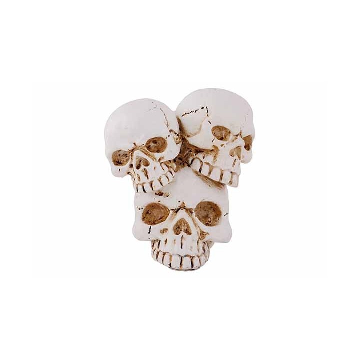 Three stacked skulls in a weathered white finish, showcasing intricate cracks and details.
