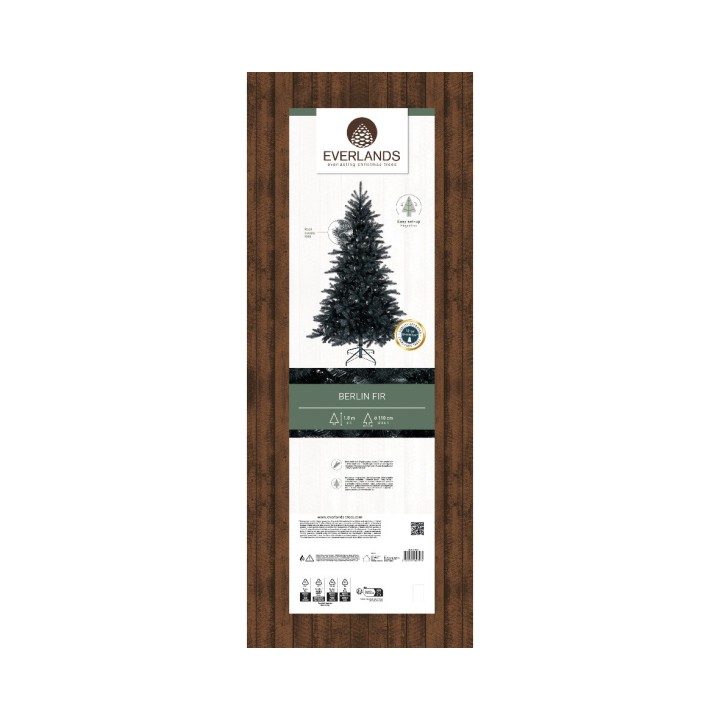 A vertical packaging design featuring a black Christmas tree illustration on a wooden background.