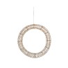 A large, circular pendant light made of intricate golden wire. A large, circular pendant light made of intricate golden wire.