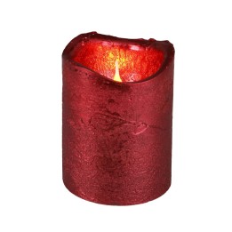 A deep red, textured candle with a flickering light at the top.