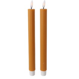 Two tall, slender orange candles with white bases, each topped with a flickering flame.