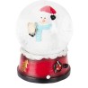 Kleine sneeuwglobe met een vrolijke sneeuwman in een rode hoed op een kleurrijke basis. Kleine sneeuwglobe met een vrolijke sneeuwman in een rode hoed op een kleurrijke basis.