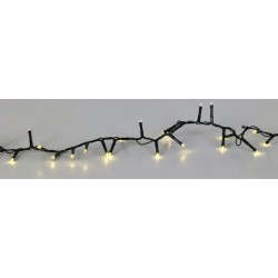 A string of warm white lights on a dark wire, softly glowing.