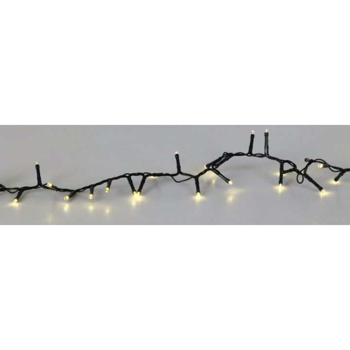 A string of warm white lights on a dark wire, softly glowing.