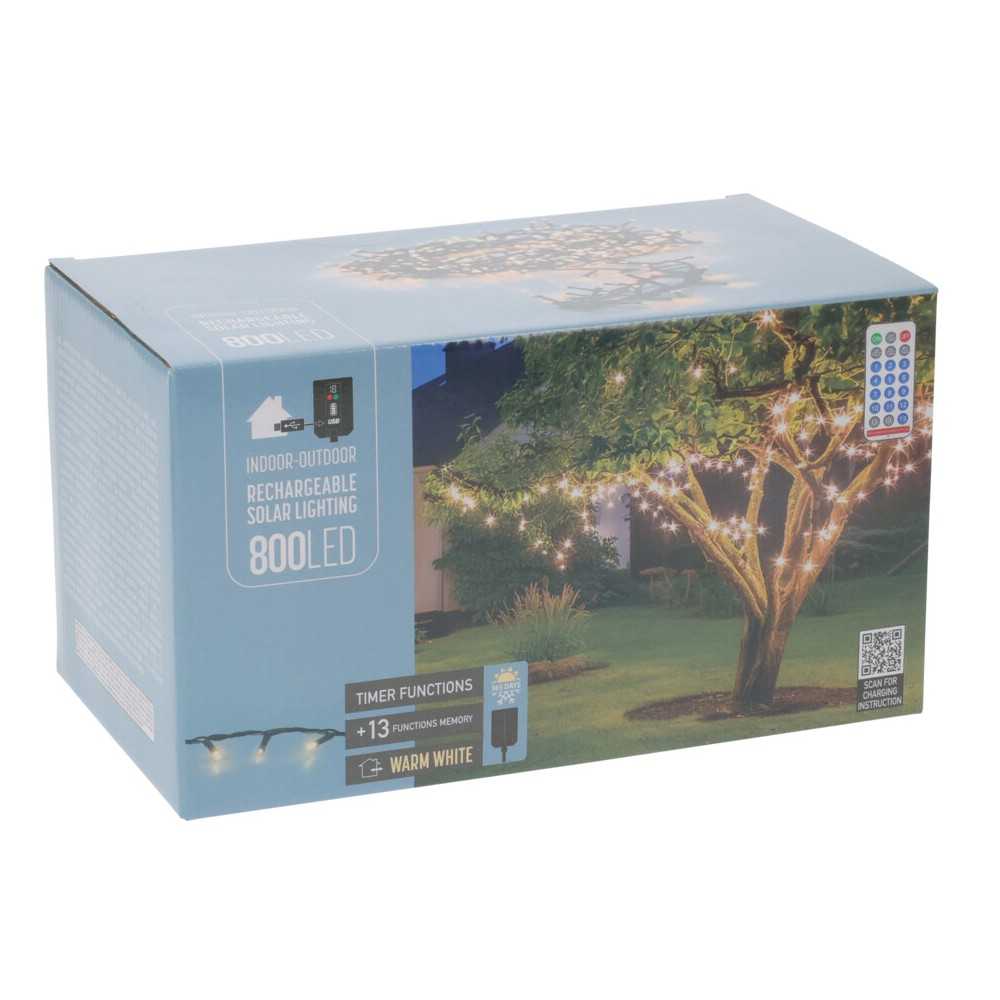 A box displaying warm white LED string lights for indoor and outdoor use, featuring a tree.