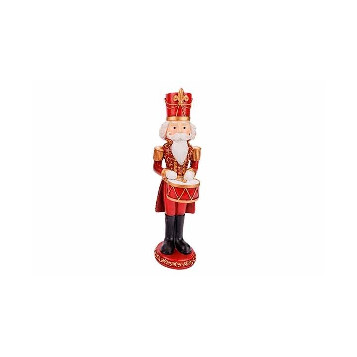 A festive nutcracker soldier in red and gold, holding a drum with a white beard and crown.
