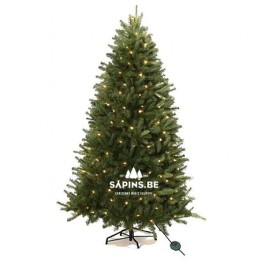 Sapin de Noël artificiel vert, décoré de lumières blanches, sur un support noir.