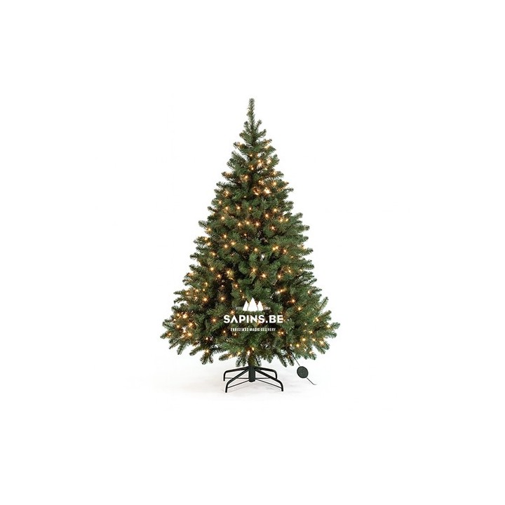 A lush green artificial Christmas tree adorned with warm white lights.