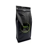 A sleek black bag of coffee with a bright green label reading "Brazil." A sleek black bag of coffee with a bright green label reading "Brazil."