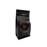 A sleek black coffee bag with bold red accents and stylish typography. A sleek black coffee bag with bold red accents and stylish typography.