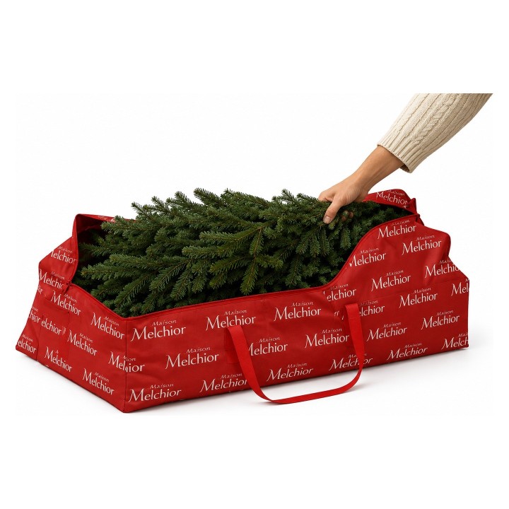 Un sapin de Noël artificiel dans un sac rouge avec des poignées.